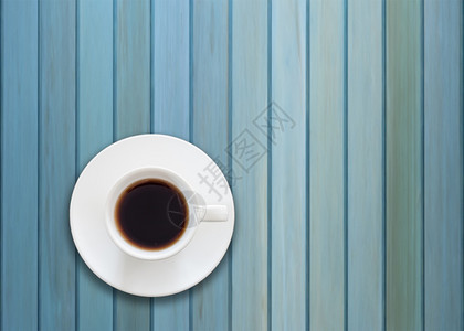 蓝色木本底新鲜咖啡杯顶端视图图片
