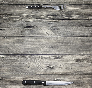 菜单创建餐厅菜单咖啡棒带叉子和刀的木制桌良好背景可用于餐饮或酒吧菜单列表图片