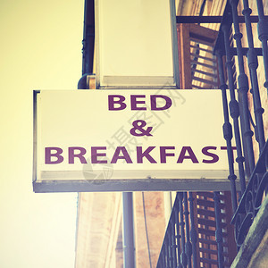 床铺和早餐旅馆标志Retro风格过滤图像图片
