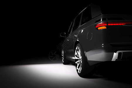 在黑色背景的聚光灯下3D制成奢华汽车3D制成在聚光灯下现代黑色SUV车的背面背景图片