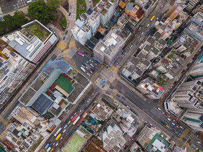 ShamShuiPo区具有交叉街道的汽车建筑和交通背景图片