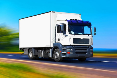 创意抽象航运业物流输和货物流和业商概念白色运货卡车或集装箱汽拖在公路或高速上移动效果模糊的白色卡车或集装箱汽拖图片