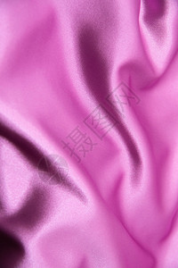平滑优雅的粉色丝绸可用作背景图片