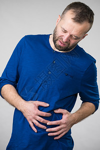 肚子肝痛的人不舒服生病和健康的人图片