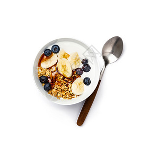 健康素早餐新鲜蓝莓香蕉豆酸奶和红糖浆白底平地顶楼有新鲜蓝莓大豆酸奶和糖浆图片