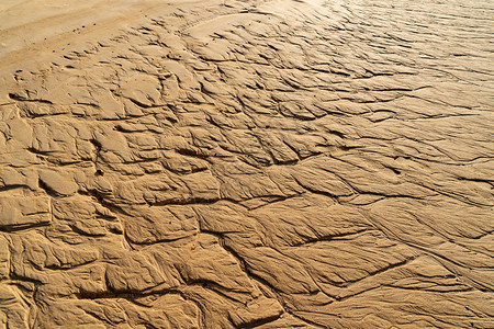 棕色波沙或岩石图案布局背景的浅滩或沙漠顶视图门外图片