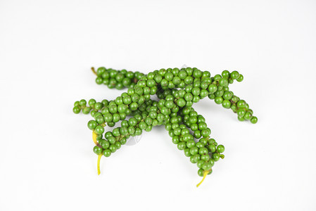 在白色背景上孤立的胡椒玉米新鲜绿色胡椒种子图片