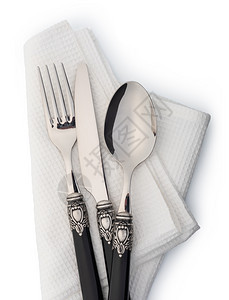 餐具套装有叉子刀和勺白色背景隔离在上图片