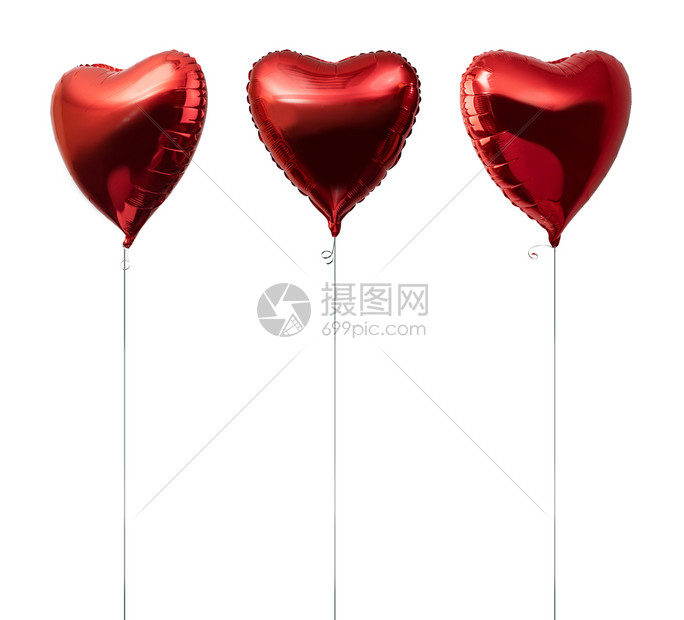 白色背景上隔绝的红心大金属气球白色的红心大金属气球图片