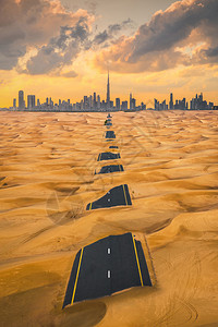 城市公路迪拜市中心天线的空景象有半条沙漠路阿拉伯联合酋长国或阿金融区和智能城市的商业区日落时有天梯和高楼背景