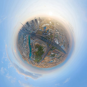 小行星360度球体迪拜下城天线和高速公路阿拉伯联合酋长国或阿城金融区日落时天梯大楼的空中观察全景图片