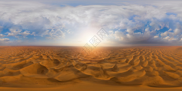 在阿拉伯联合酋长国迪拜市红沙漠搜索和丘的空中观察无缝全景日落时的自然景观背图片