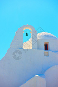 白色教堂希腊Mykonos岛PanagiaParaportiani教堂门和贝利背景