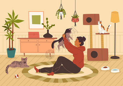 年轻女孩和宠物猫咪在客厅玩耍图片