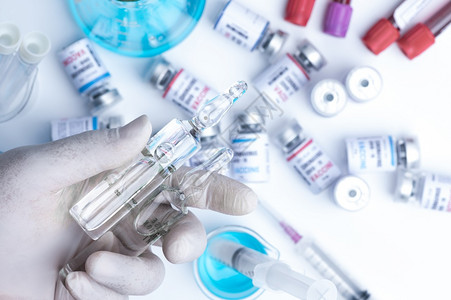 注射胰岛素研制冠状新冠19保险概念中的疫苗瓶和防治冠状2019ncov治愈实验室医学研究以阻止传播背景