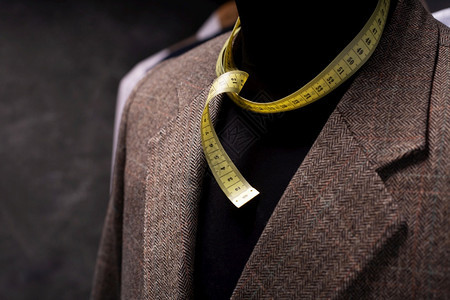 关于男裁缝模特和胶带测量服装饰的创造概念西装外套图片