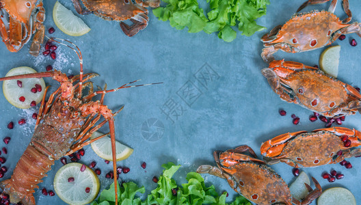 甲壳类食物框架龙虾螃蟹柠檬和石榴图片
