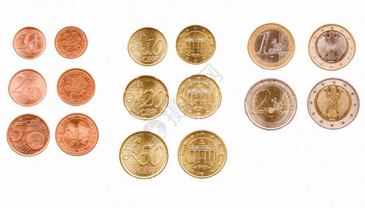 全部欧元硬币白旧钞上孤立的欧元硬币图片