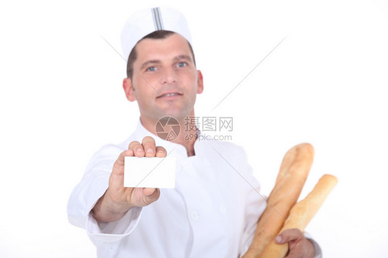 持有空白名片的面包工人图片