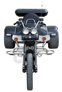 三轮摩托车的骑自行者图片