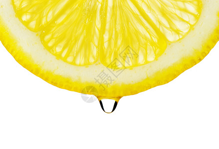 片段柠檬与滴在光谱上详细的照片它被隔离在白色背景上高清图片
