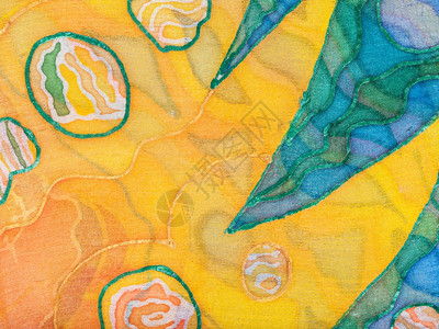 纺织背景在丝棒上涂有黄色和绿抽象手饰背景图片