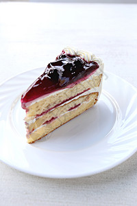 蓝莓蛋糕甜点在白菜restaurant咖啡厅图片