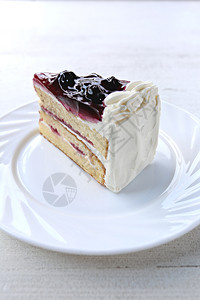 蓝莓蛋糕甜点在白菜restaurant咖啡厅图片