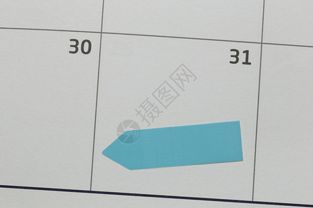 31上的日历并有空白蓝纸注释用于输入工作概念的想法图片