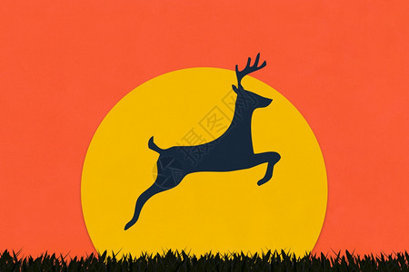 鹿是用木头风格的艺术纸做野外日落纸艺术图片