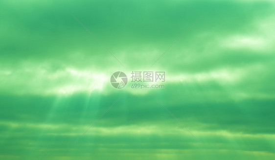 天王星上的由艺术家代表太阳的光线穿透云层天王星上由艺术家代表图片