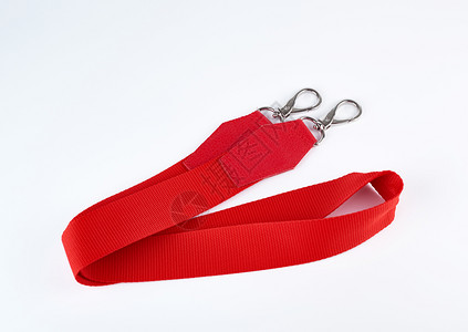 红色纺织手柄和金属扣用于白色背景的包图片