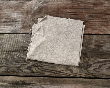 Gary厨房毛巾折叠在灰色木桌上从旧板顶部视图空间折叠图片