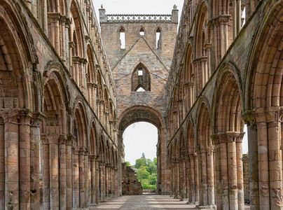 教堂拱门查看苏格兰边界杰德堡修道院废墟内的拱门查看苏格兰边界的杰德堡修道院废墟背景