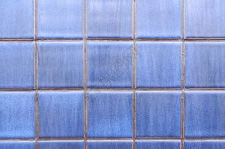 游泳池墙壁和的蓝色平方瓷砖背景工作室照片图片