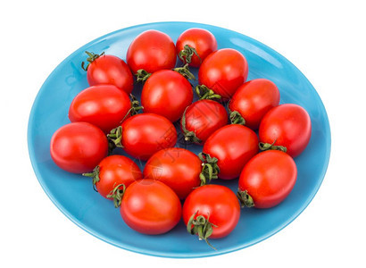 小新鲜西红柿在盘上摄影棚照片图片
