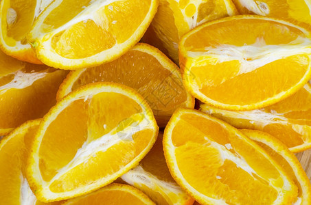 水果背景橙色切片的纹理摄影棚图片