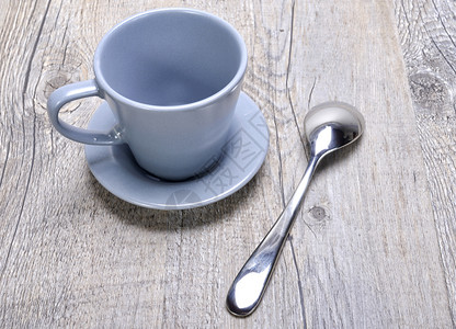 带小勺子的空咖啡杯图片
