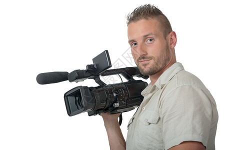 一个拥有专业摄像头的男人孤立在白色背景上图片