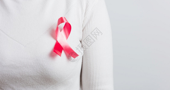 粉红乳腺癌认识丝带的亚裔妇女图片