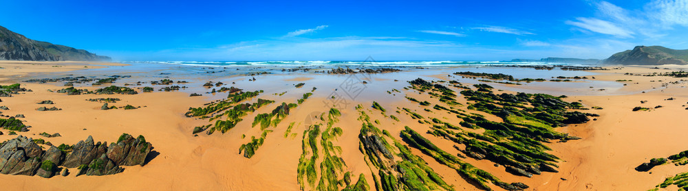 沙滩上的岩层阿尔加夫科斯塔维提纳葡萄牙图片