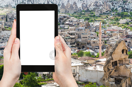 旅行概念土耳其卡帕多西亚戈雷梅镇天线旅游照片春季土耳其卡帕多西亚Goreme镇智能手机空白剪切屏广告位置背景图片