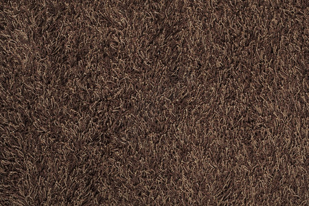 新的棕色毛地毯背景纹理茸的小地毯蓬松图片