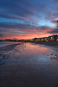 颜色Dorset的韦茅斯海滩日落天空黄昏图片
