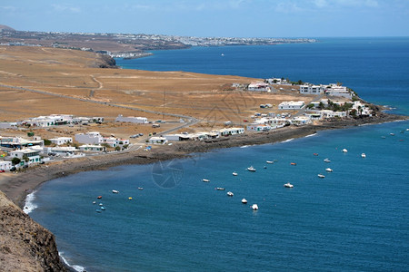 Lanzarote西班牙加那利群岛PlayaQuemada小渔村克马达兰萨罗特岛豪斯背景图片