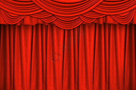 聚光灯奢华娱乐舞台上的红色闭幕为背景红色闭幕图片
