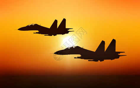 日落背景喷气战斗机士飞行员图片