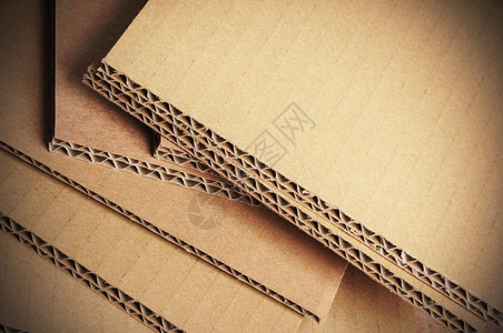 自然材料纸盒侧面折叠板视图顶层折叠纸板背景上空闲间CartonRetacl图片