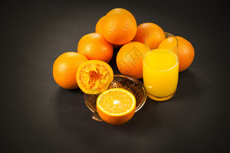 新鲜的水果门户14深底有橙子的手工果汁机图片
