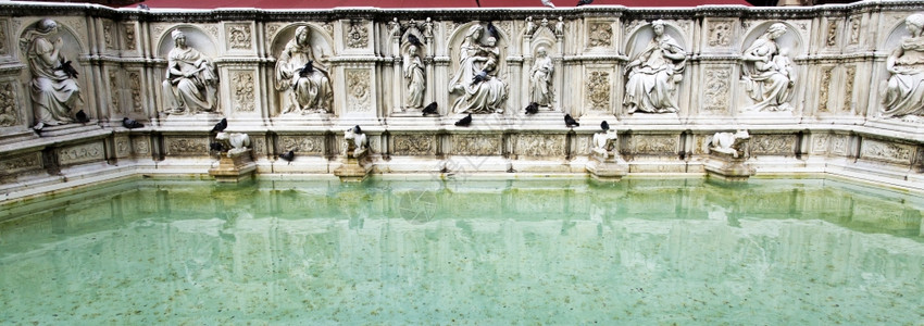 鸟欢乐泉意大利托斯卡纳省锡耶市中世纪大理石喷泉建筑学雕像图片